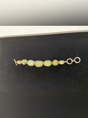 Australian triplet opal  silver bracelet.
Beautiful condition